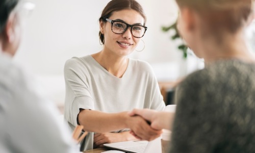 a person shaking a person's hands
